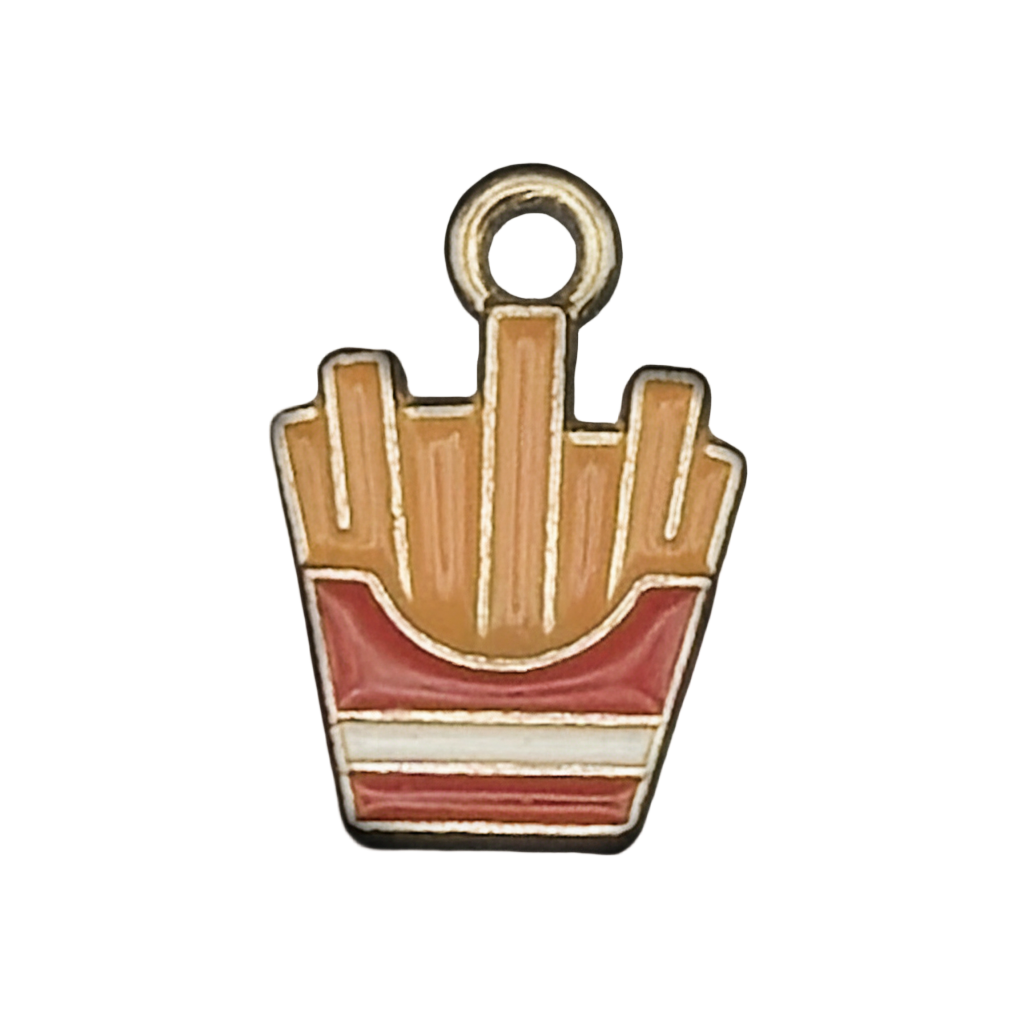 Close-up enamel french fries charm with red and white striped carton on black background.