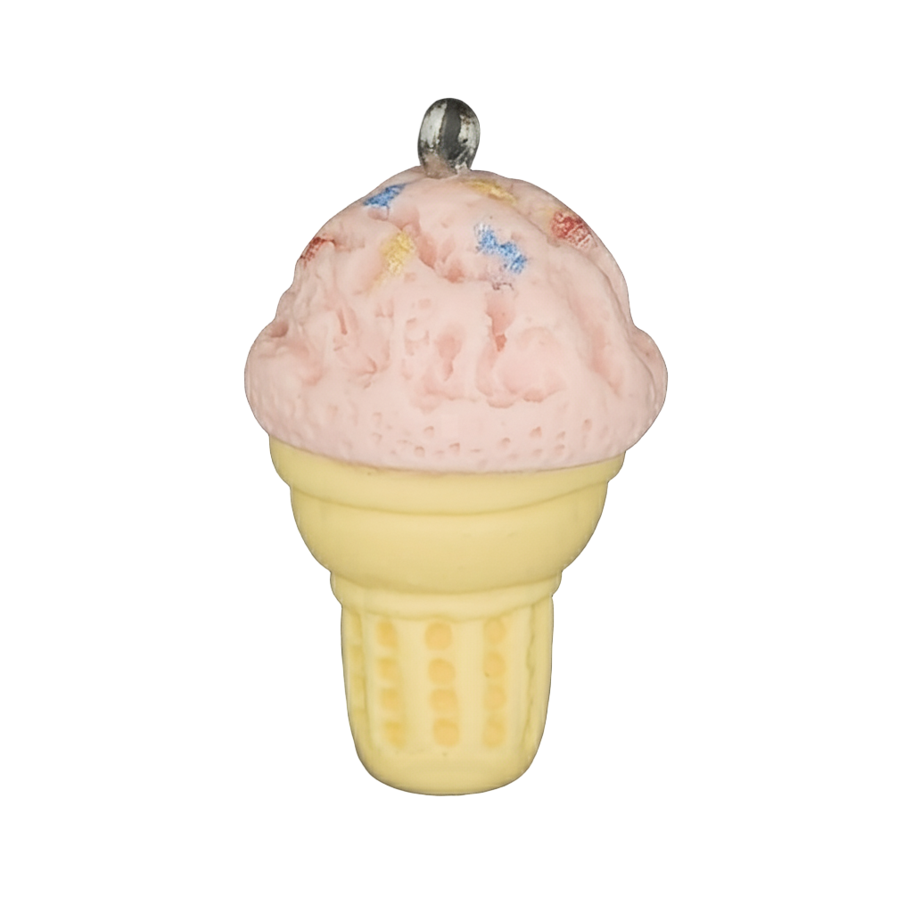 close-up of pink ice cream cone charm with sprinkles on a yellow cone against black background
