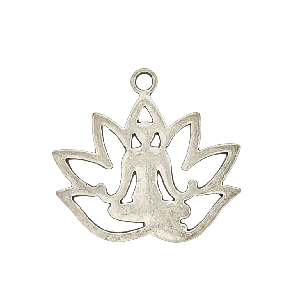 close-up of silver charm showing a meditating figure inside a lotus shape on black background