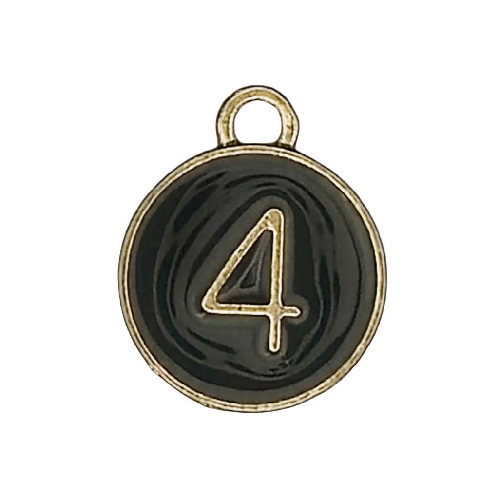 close-up of a round black charm with a gold number 4