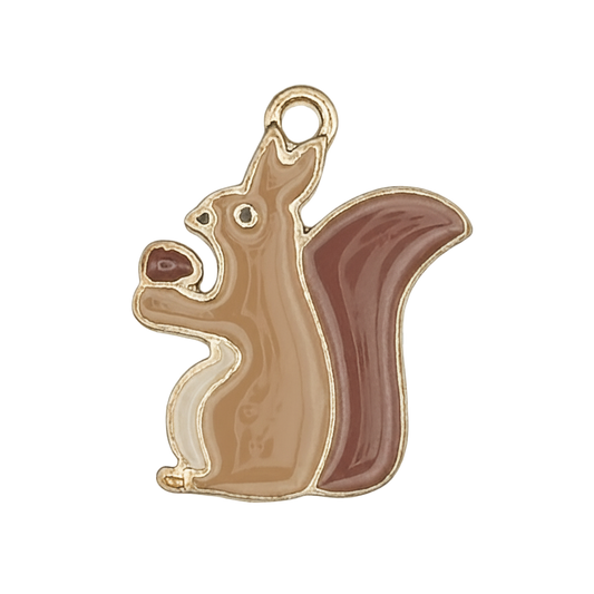 close-up of brown enamel squirrel charm holding an acorn on black background