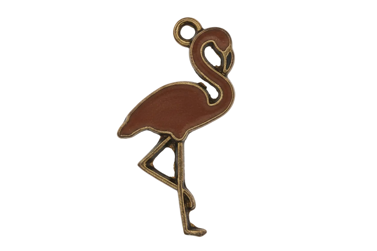 close-up of a pink enamel flamingo charm with gold outline, one leg raised