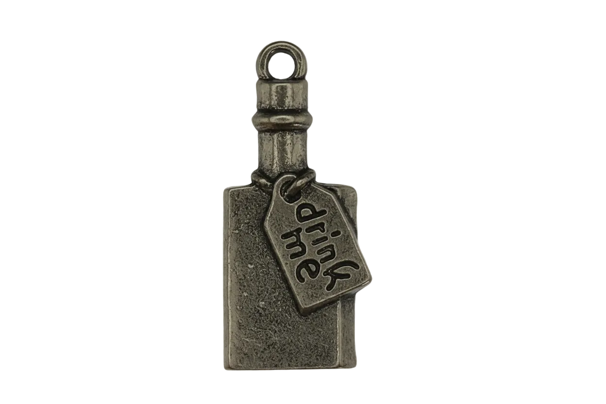 close-up of a small antique-silver bottle charm with a tag that says 'drink me'