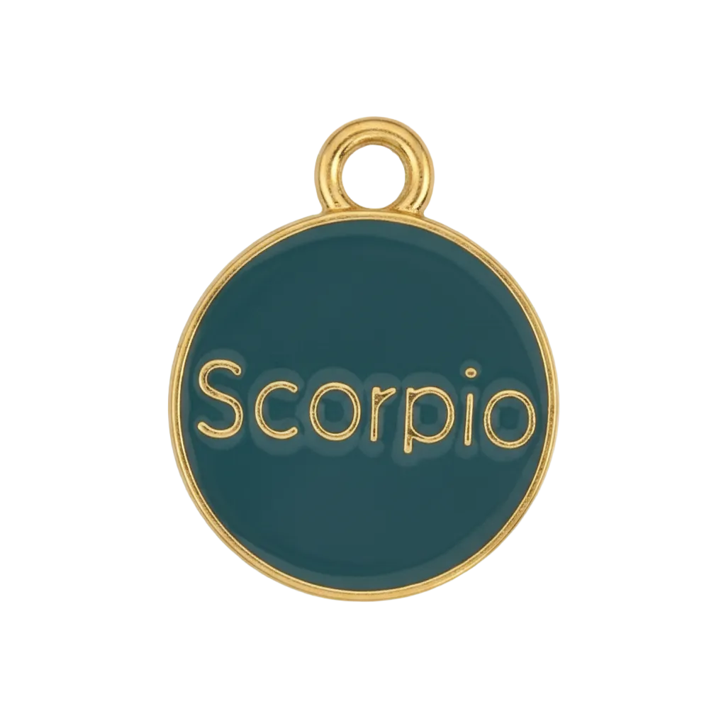 close-up of a round teal enamel charm with gold edge and the word Scorpio