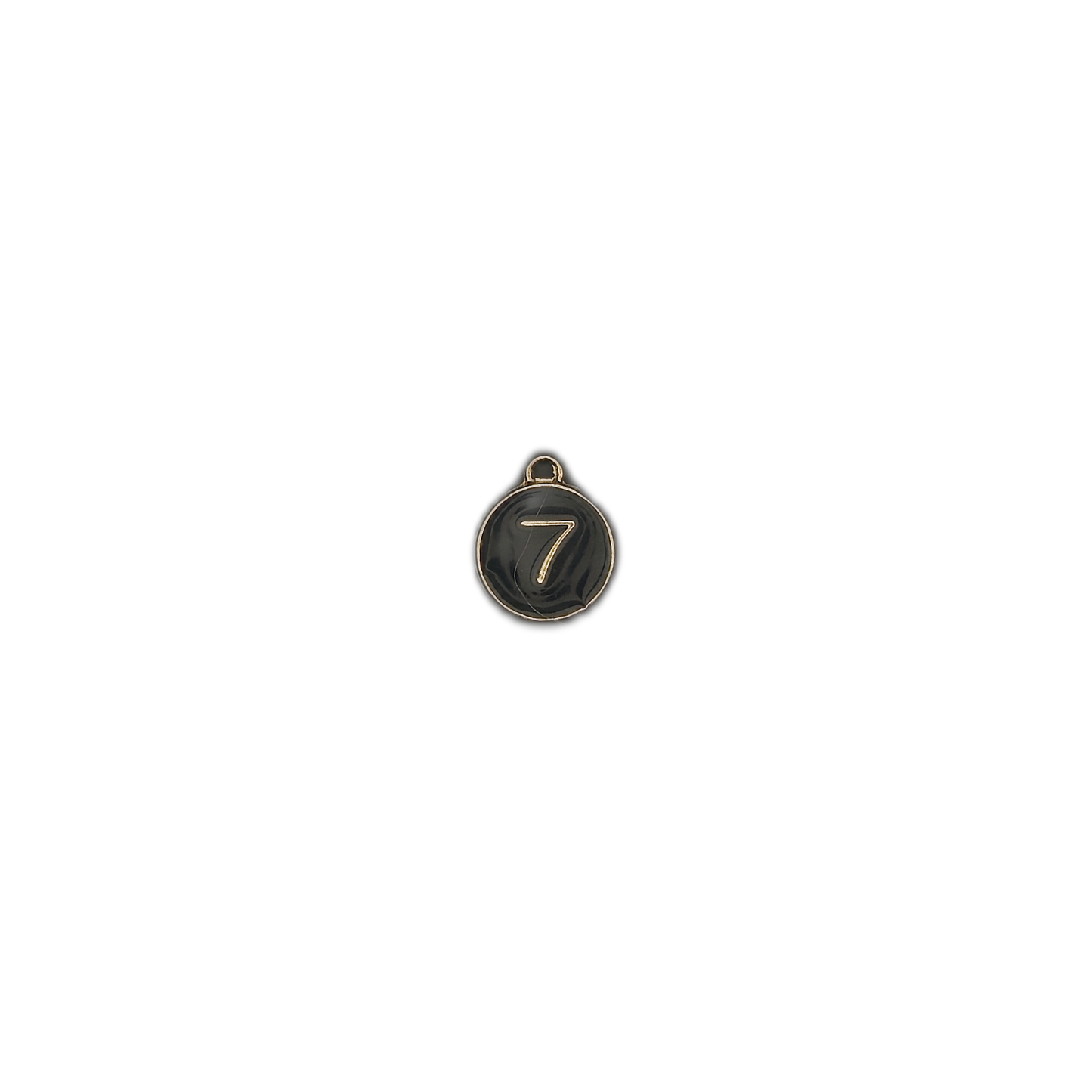 small round black charm with gold number 7 centered on black background