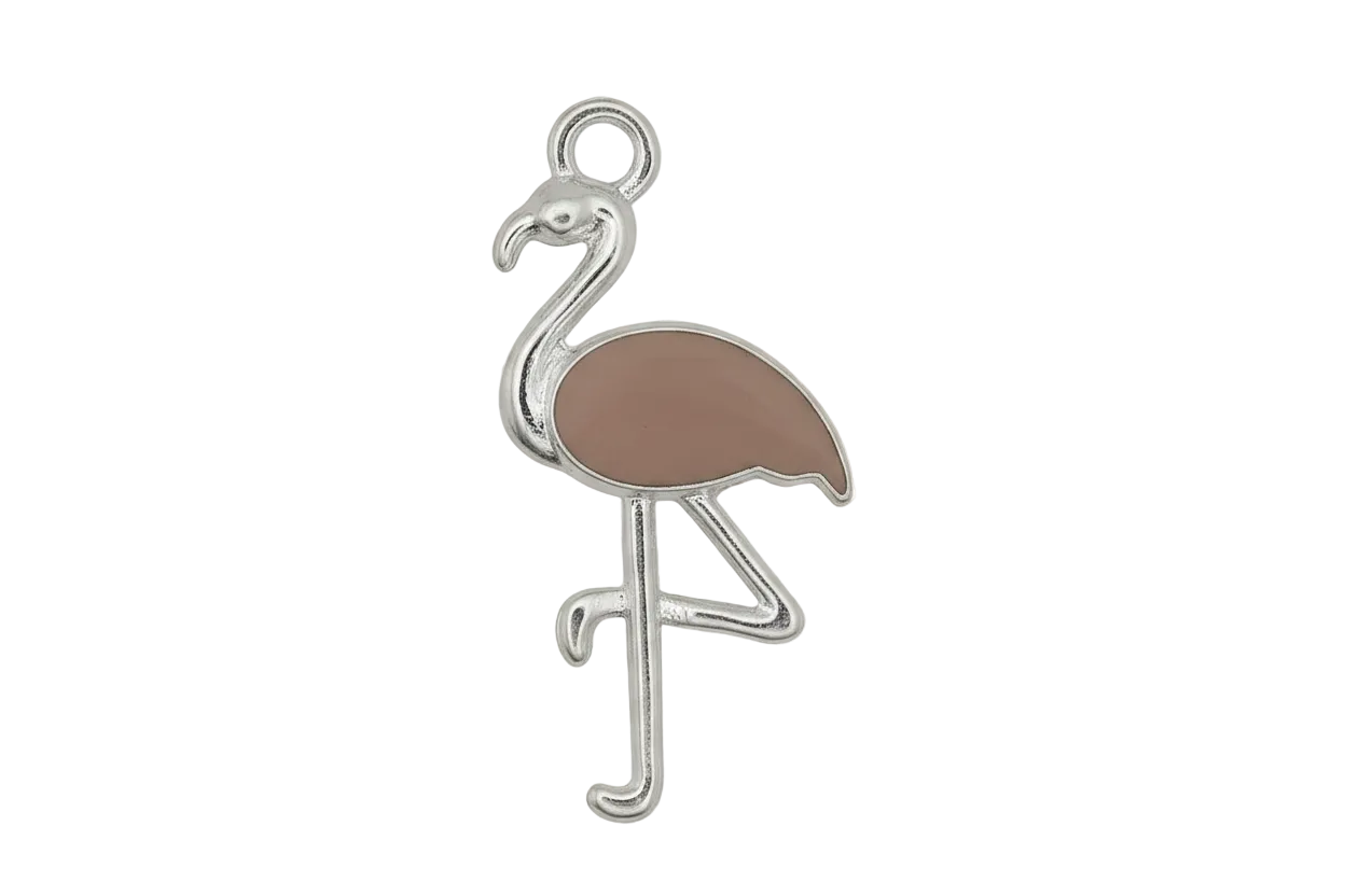 close-up of pink enamel flamingo charm with silver outline on black background