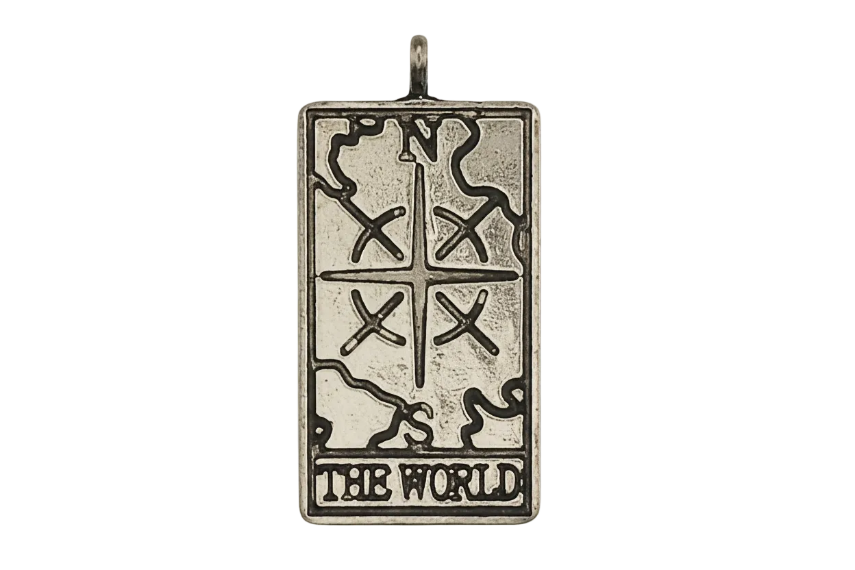 Close-up of rectangular silver-tone tarot 'The World' pendant on black background.