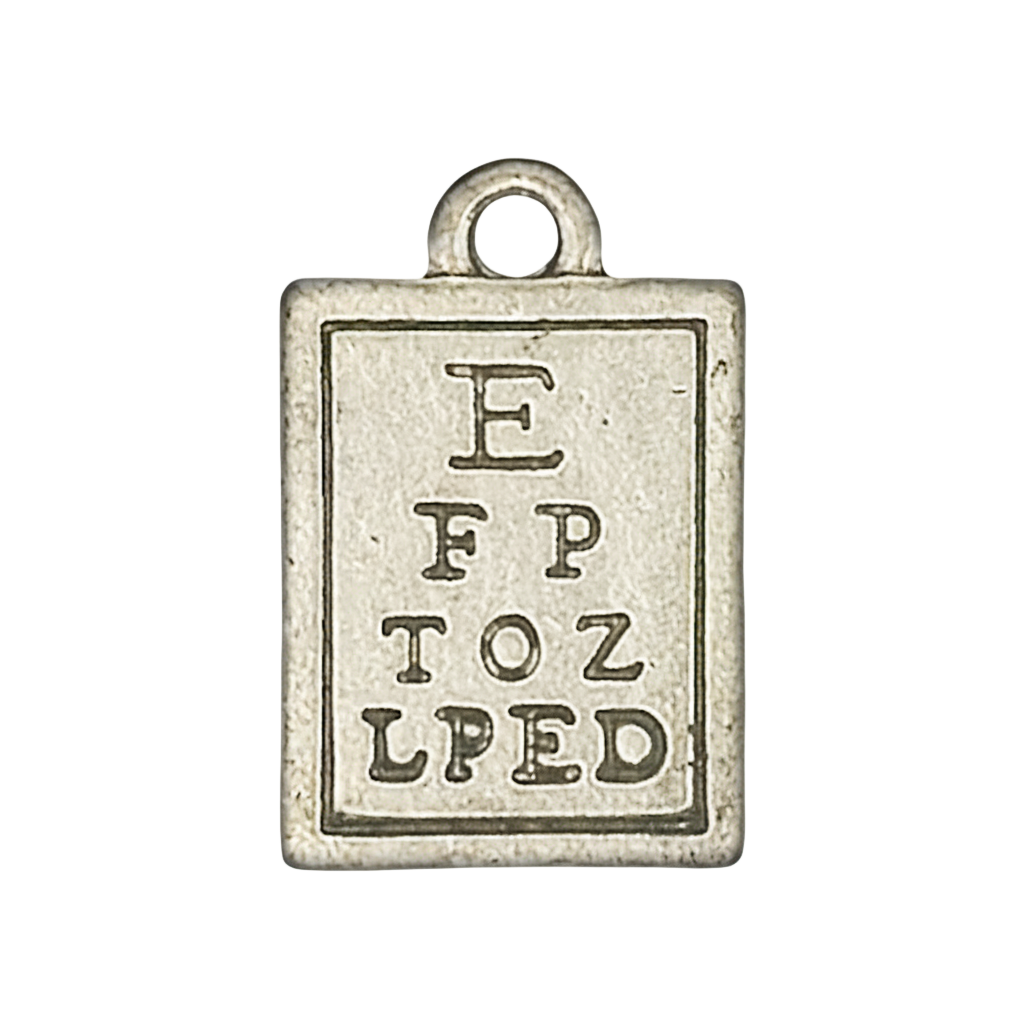 close-up of a rectangular eye chart charm in antiqued silver tone