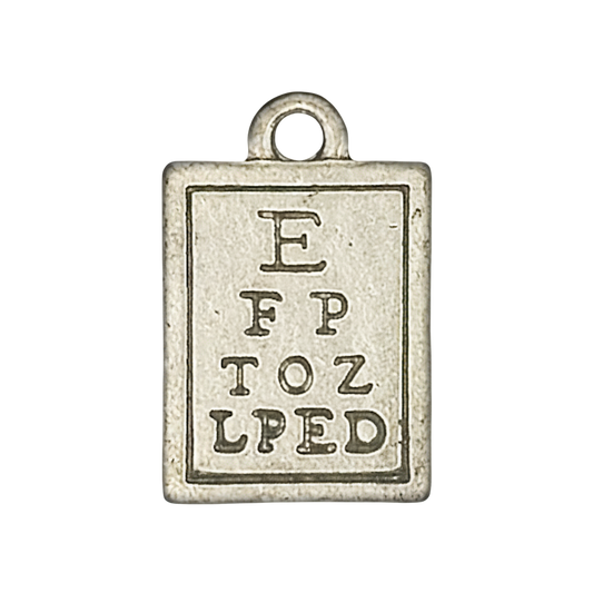 close-up of a rectangular eye chart charm in antiqued silver tone