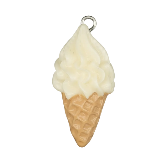 close-up of a vanilla soft-serve ice cream cone charm on a black background