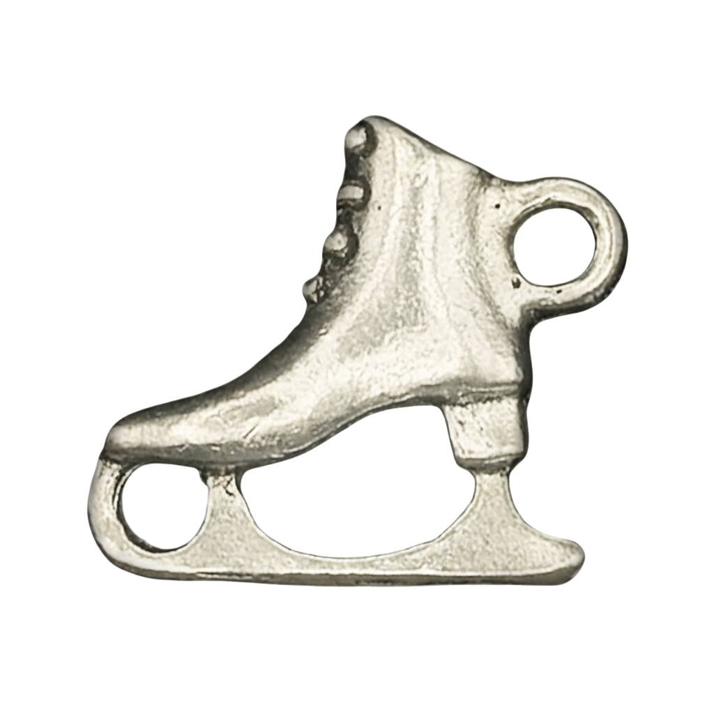 close-up of a silvertone ice skate charm on a black background