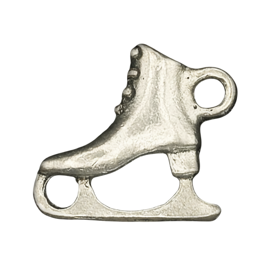 close-up of a silvertone ice skate charm on a black background