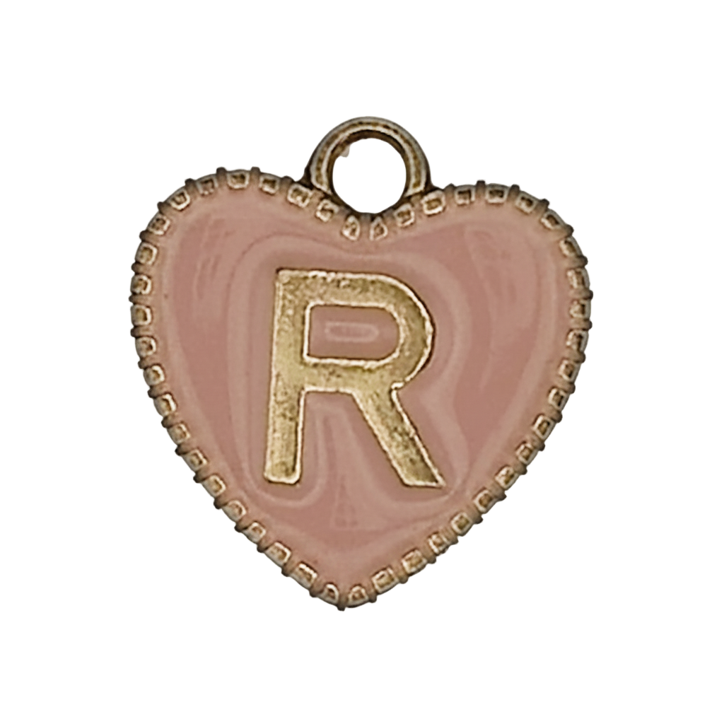 close-up of pink heart charm with gold letter R