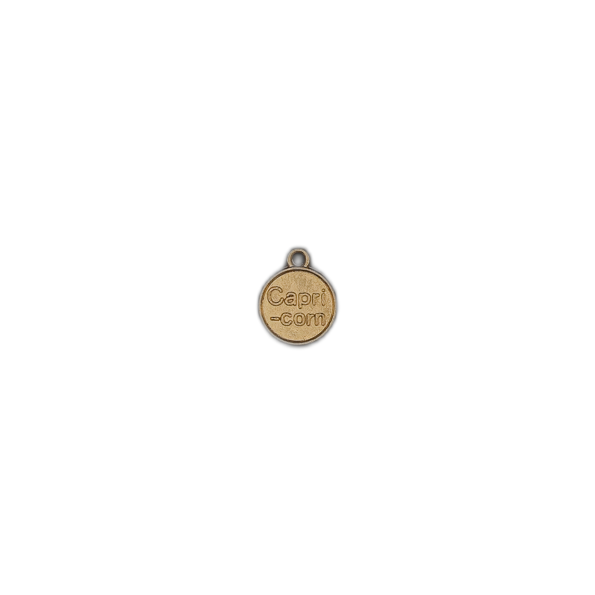 small gold round 'Capri-corn' charm centered on a black background