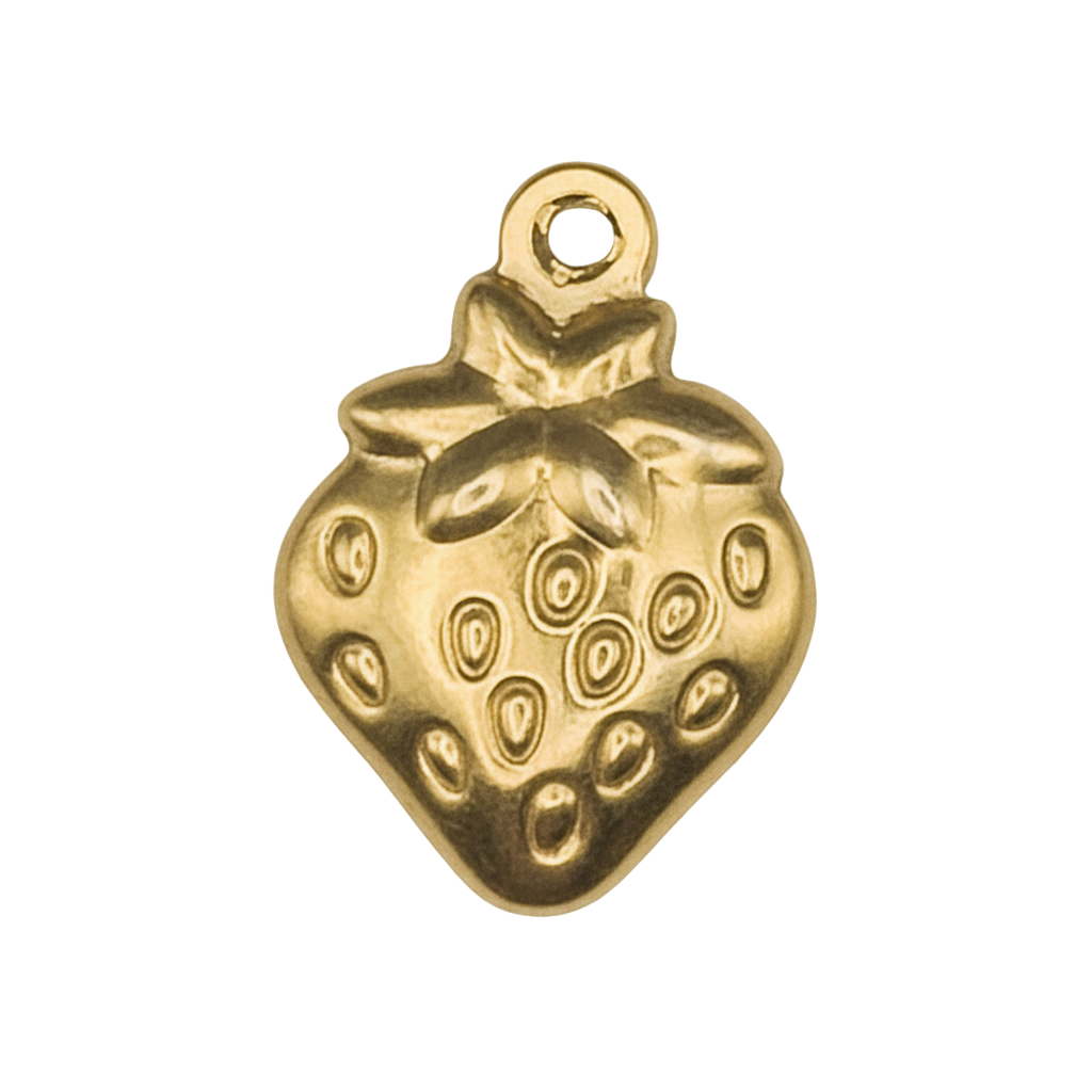 close-up of a small gold strawberry charm on a black background
