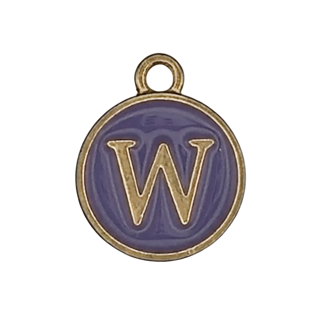 close-up of round purple enamel charm with gold letter W on black background