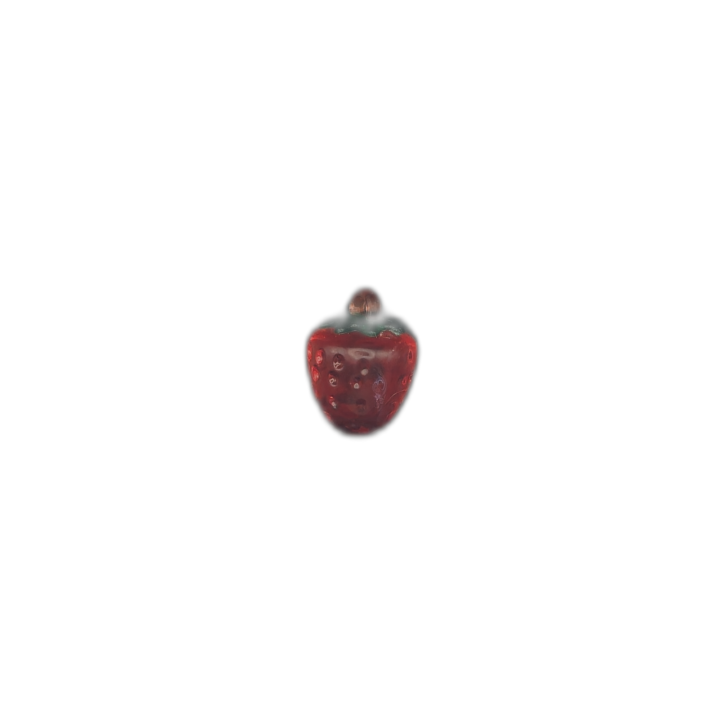 small strawberry charm centered on a black background