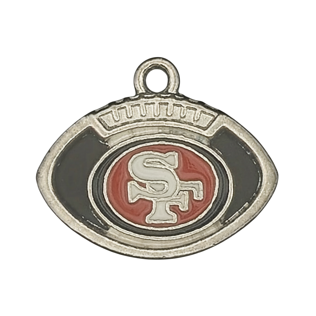 close-up of a small silver-tone football-shaped charm with red center and raised 'SF' letters on black enamel