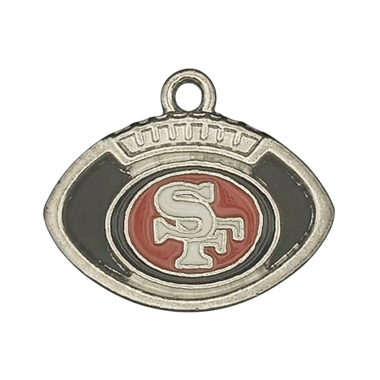 close-up of a small silver-tone football-shaped charm with red center and raised 'SF' letters on black enamel