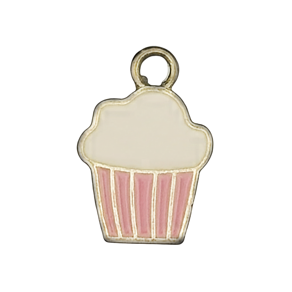 close-up of a small gold-tone cupcake charm with white icing and pink striped liner on a black background