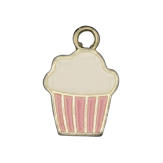 close-up of a small gold-tone cupcake charm with white icing and pink striped liner on a black background