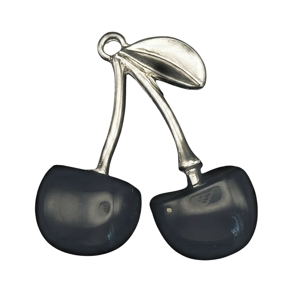 close-up silver double cherry charm with leaf on black background