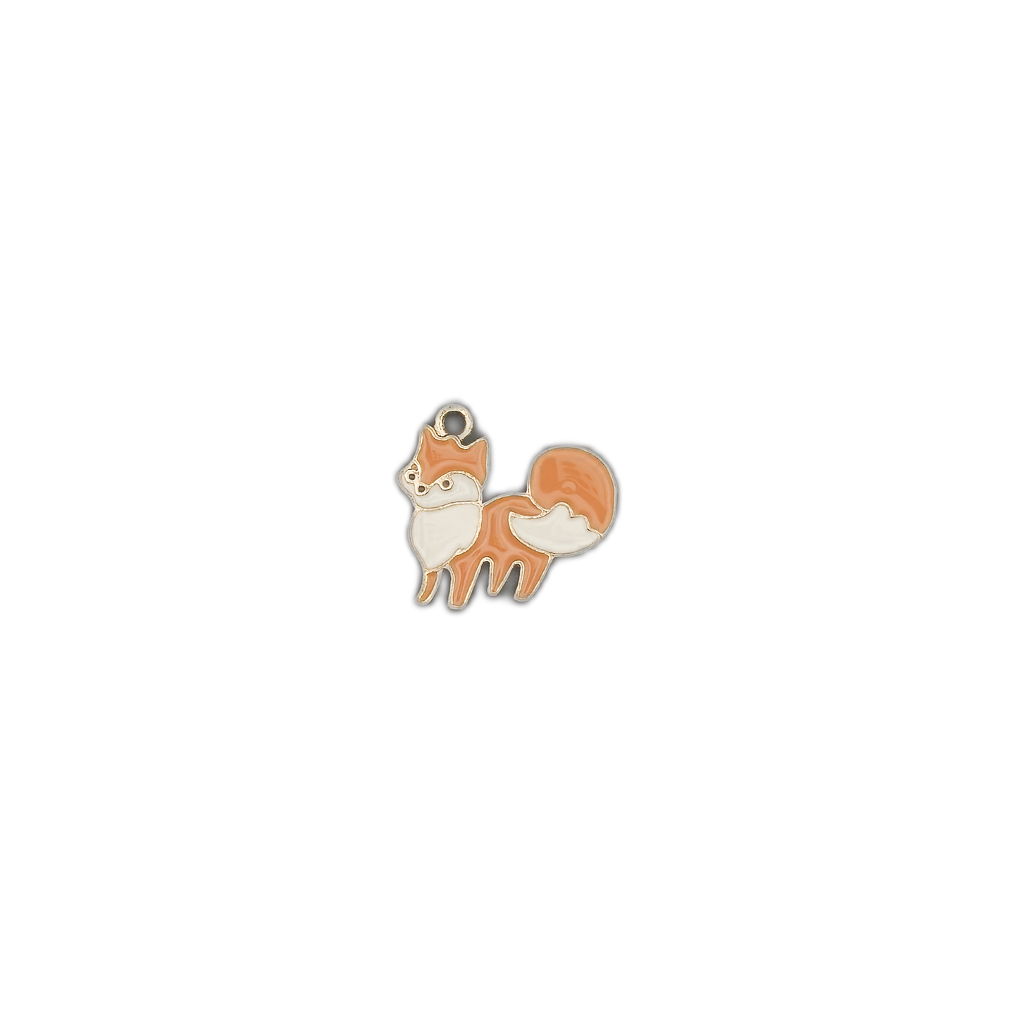 small orange and white fox charm centered on a black background