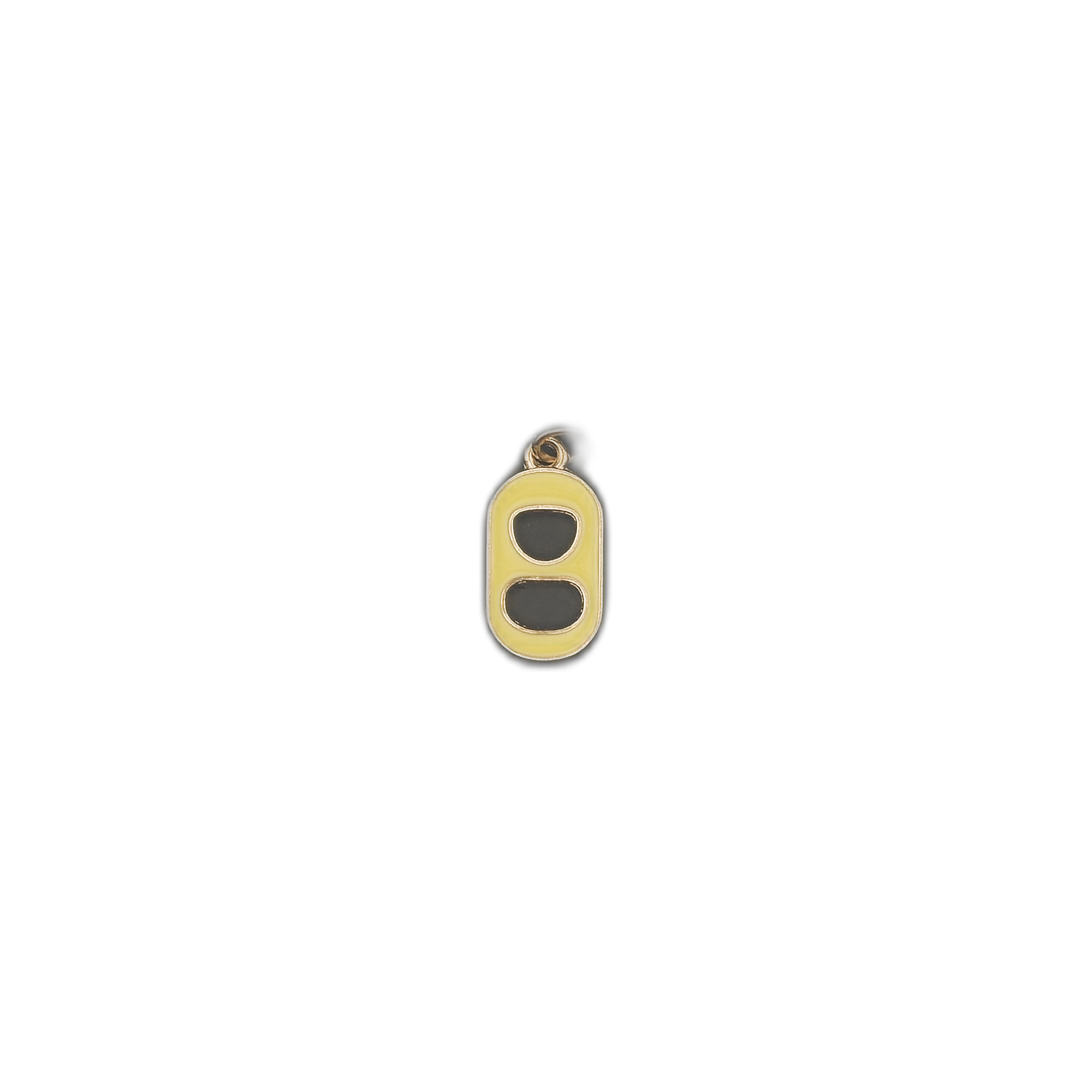 Small yellow soda tab charm centered on a black background.