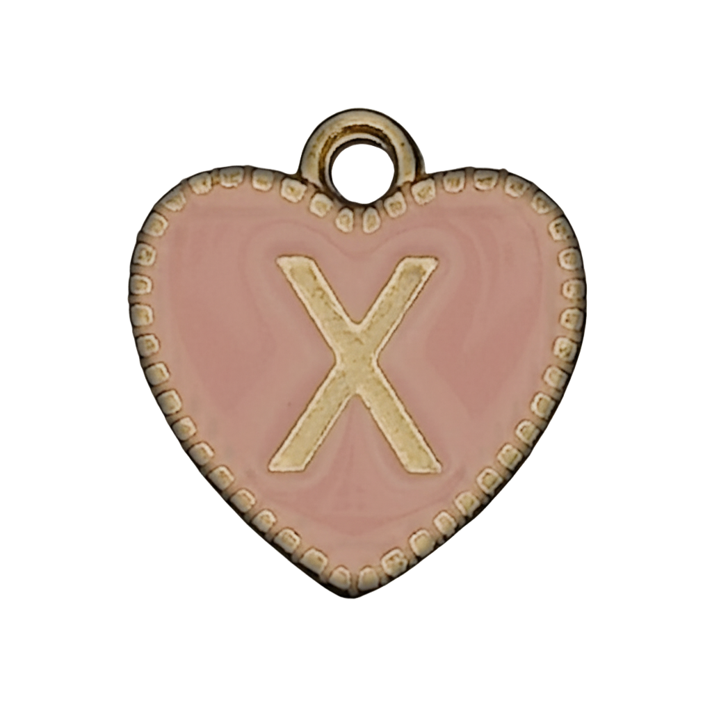 close-up of pink heart charm with gold X and dotted border