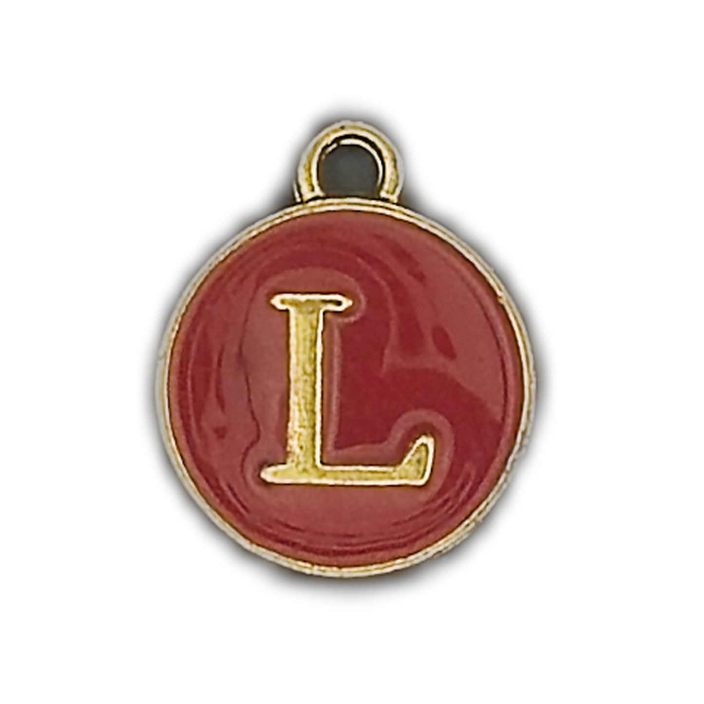 Close-up of a round red enamel charm with a gold letter L and gold rim.