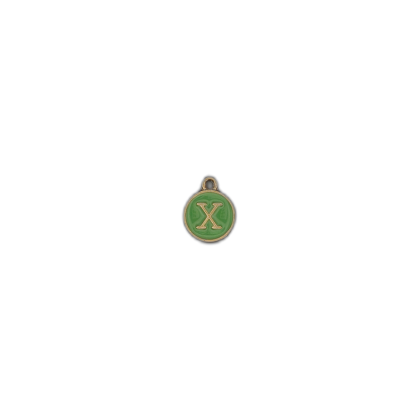 Small round green letter X charm centered on a black background.