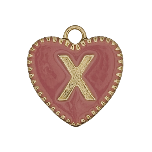 close-up pink enamel heart charm with gold X