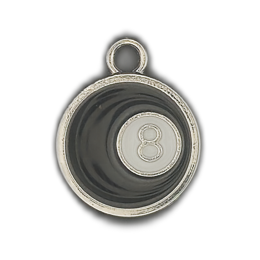 close-up of black eight ball charm with silver edge and white 8