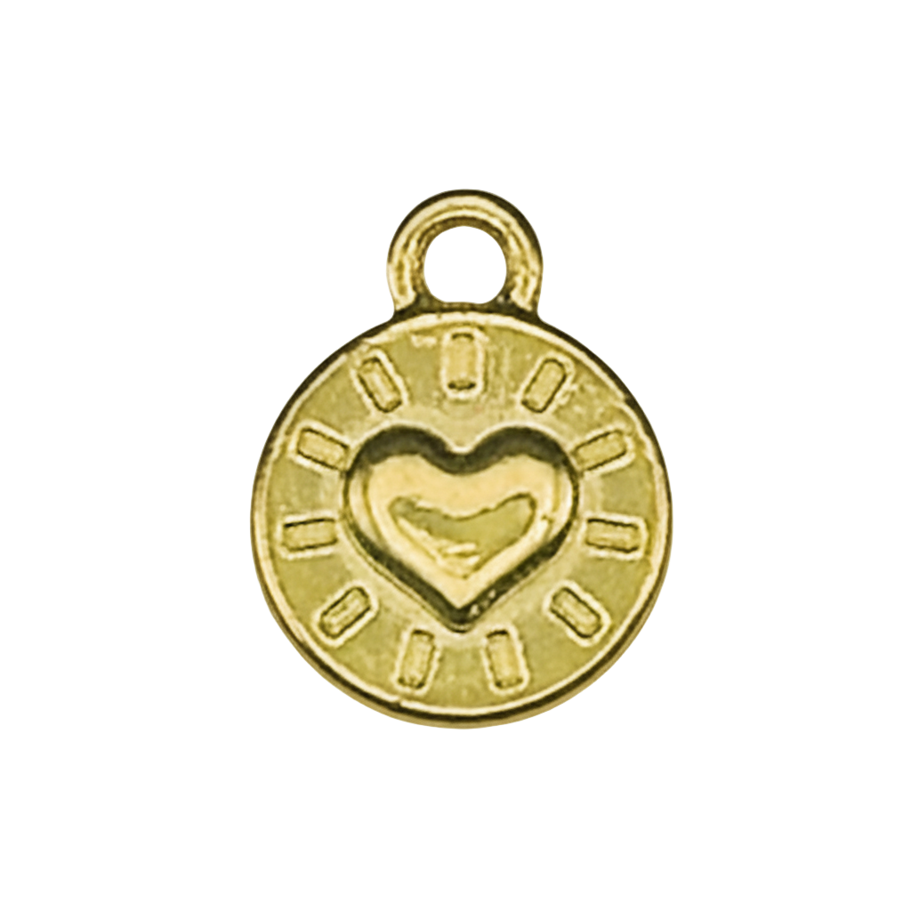 close-up of a small gold-tone round charm with a raised heart and radiating marks on a black background