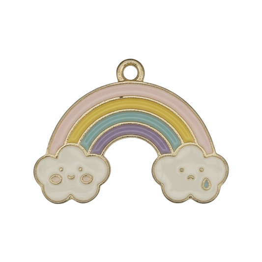 close-up of pastel rainbow charm with two white clouds on a black background