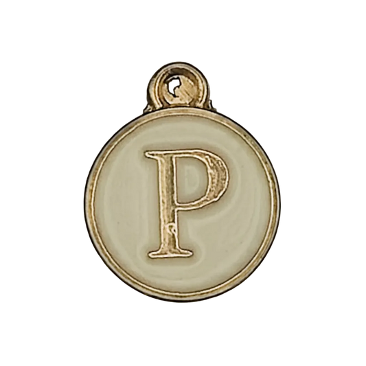 Close-up of round gold-tone charm with letter P on cream enamel.