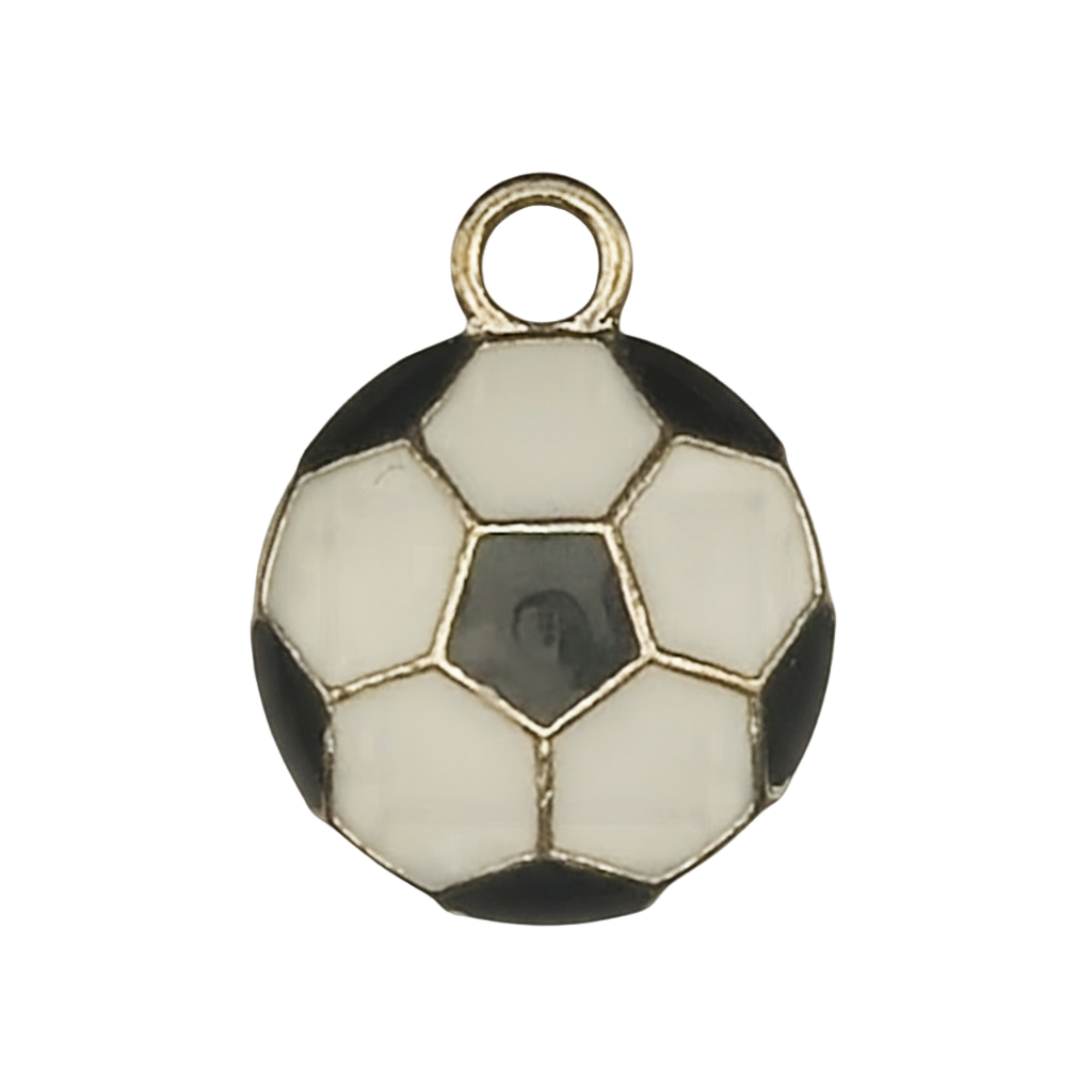 Close-up of a small black and white enamel soccer ball charm with gold-tone outline on a black background.