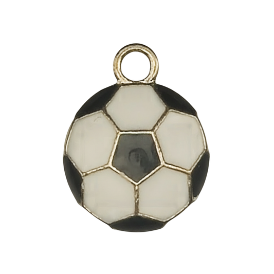 Close-up of a small black and white enamel soccer ball charm with gold-tone outline on a black background.