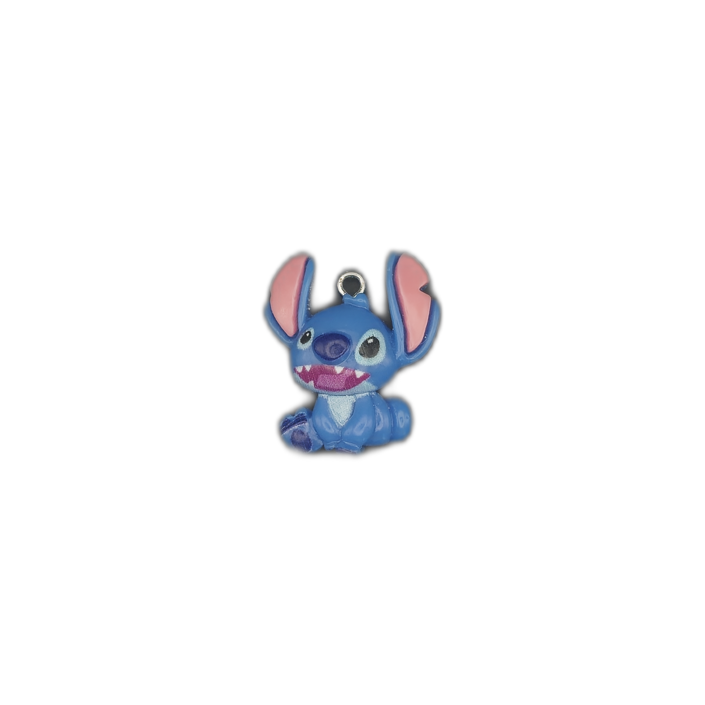 small blue alien character enamel charm centered on black background