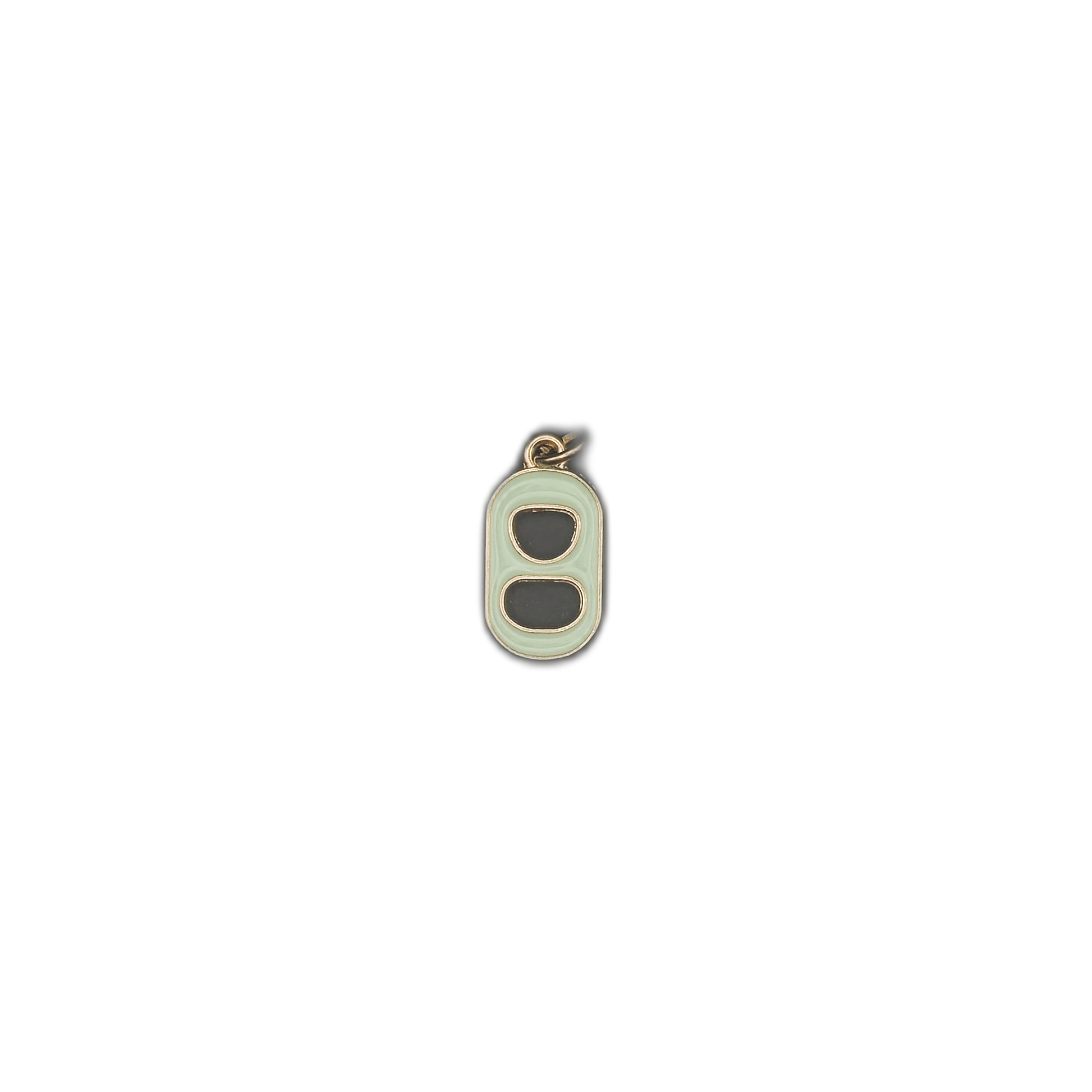 small soda can tab charm on black background