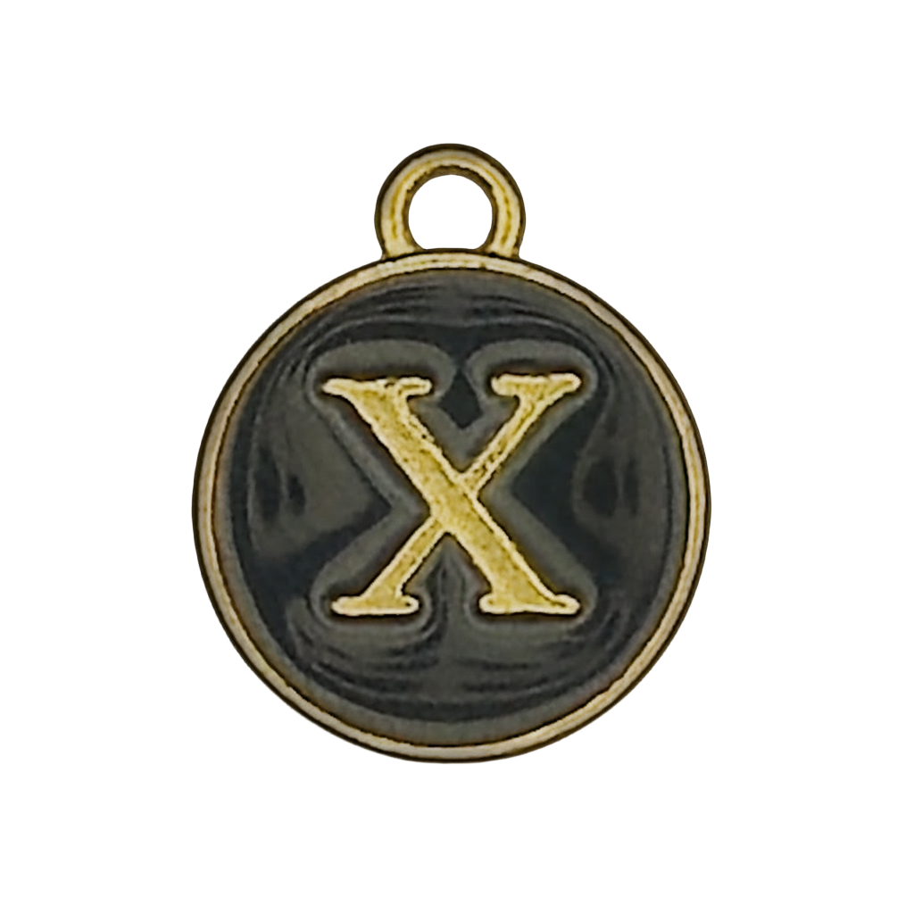close-up of round black charm with gold letter X and gold rim