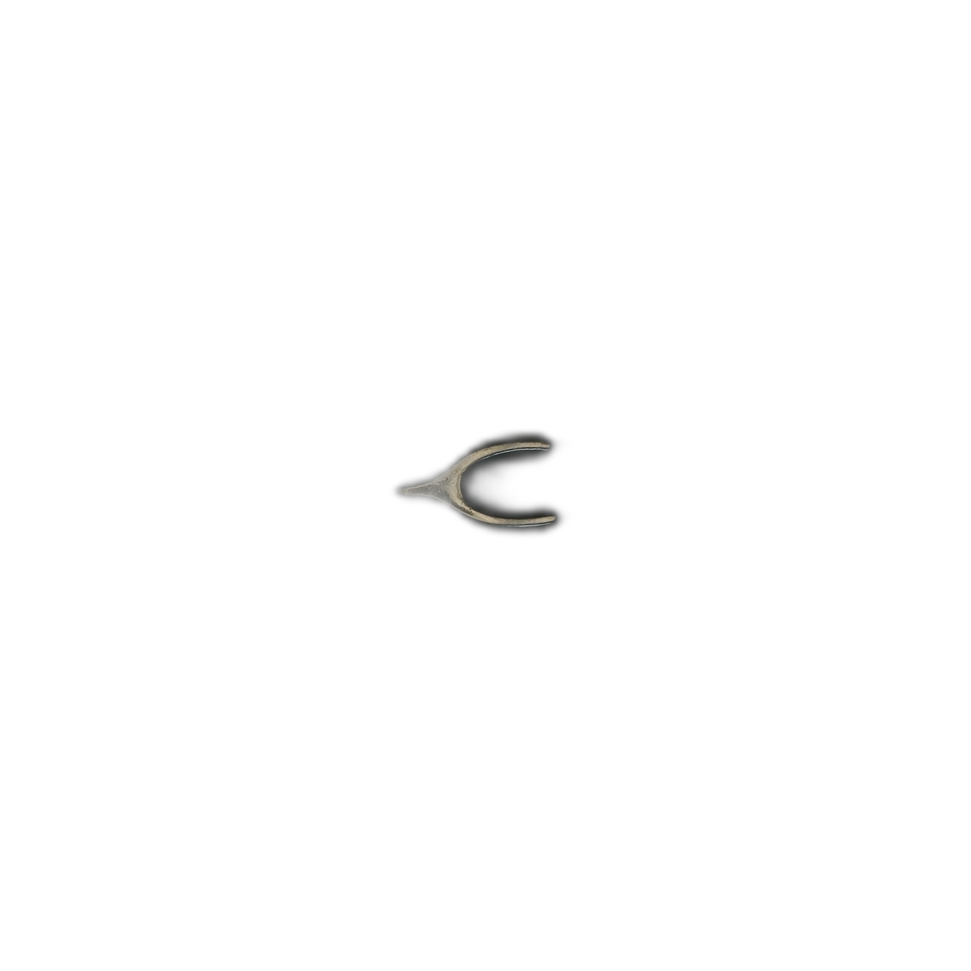small metallic wishbone charm on black background