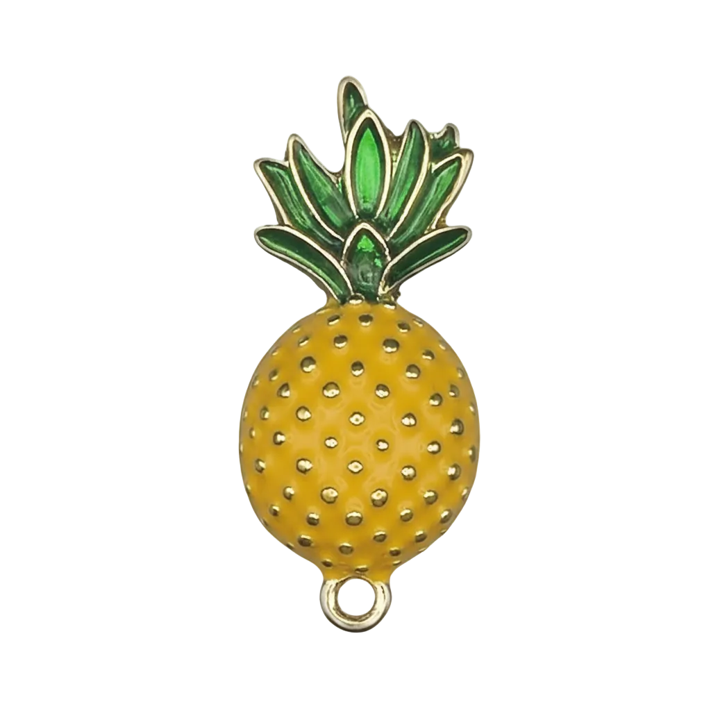 close-up of yellow and green enamel pineapple charm on black background