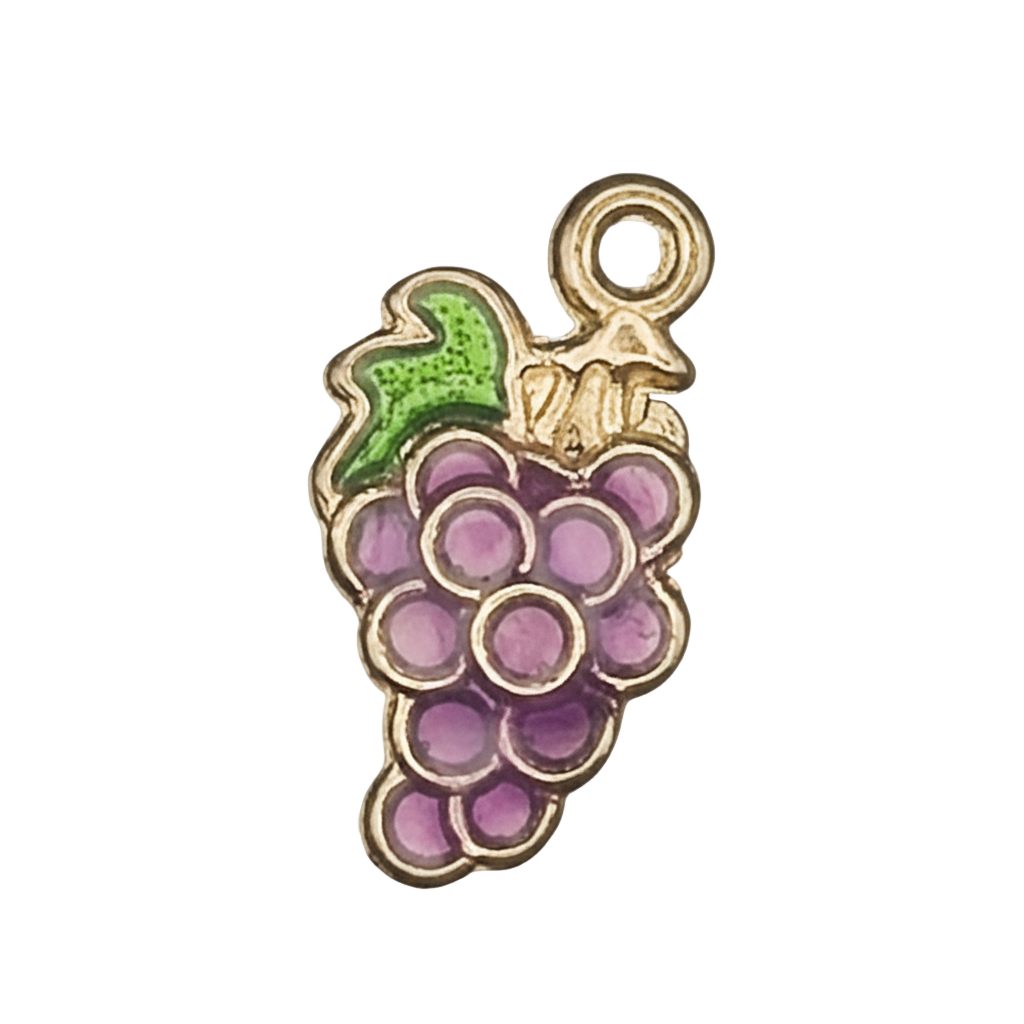 close-up of gold-tone grape cluster charm with purple enamel and green leaf