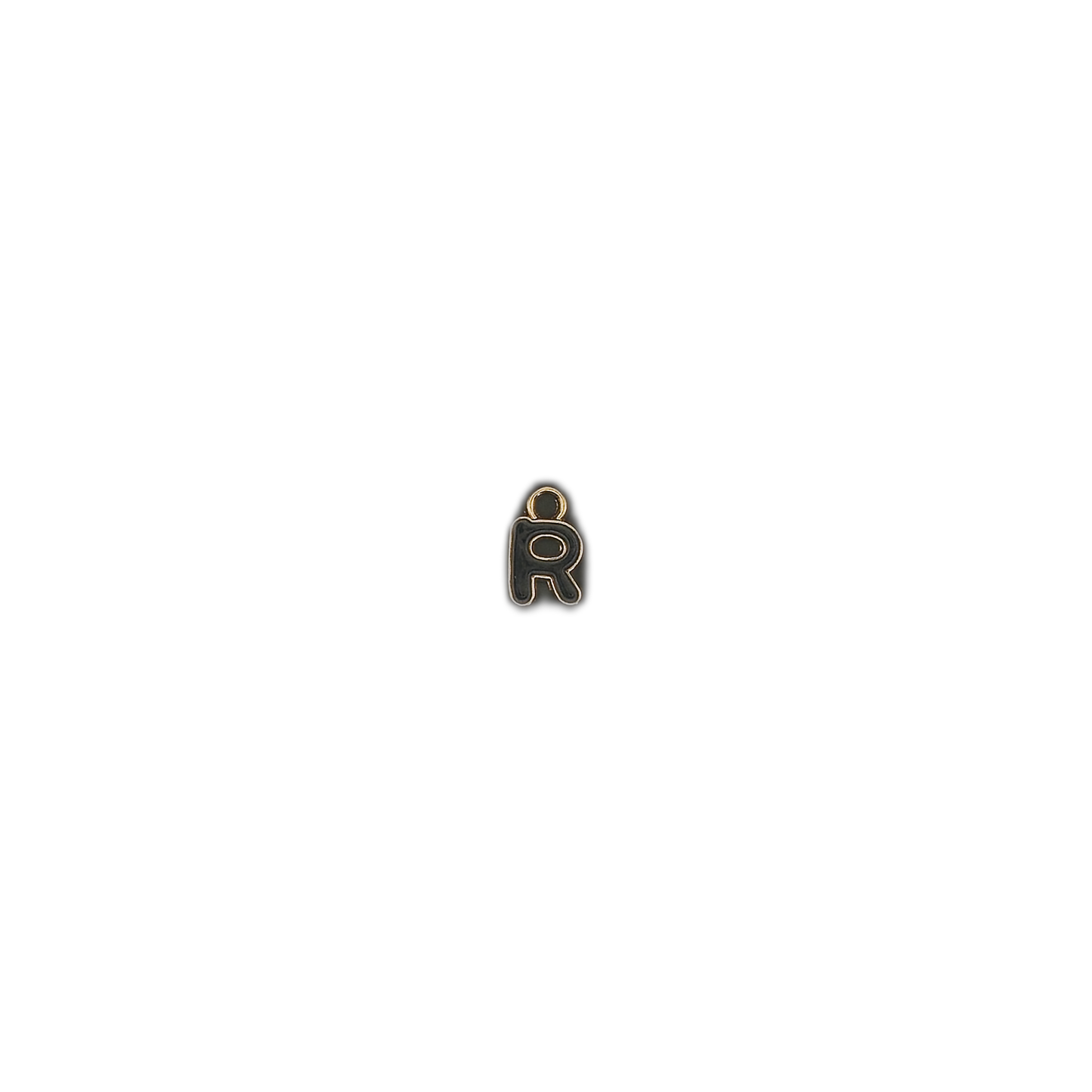 Small letter R charm centered on a black background.