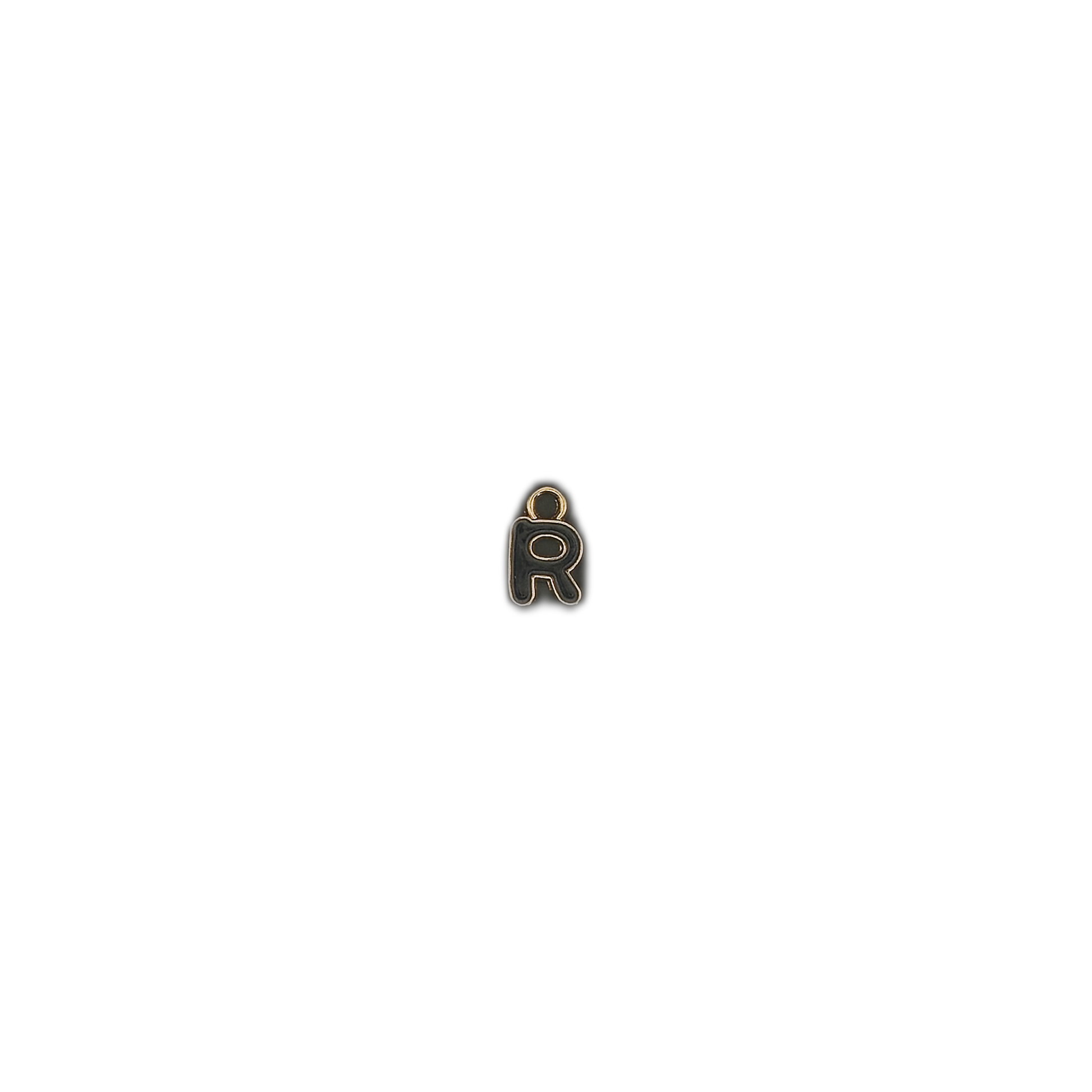 Small letter R charm centered on a black background.