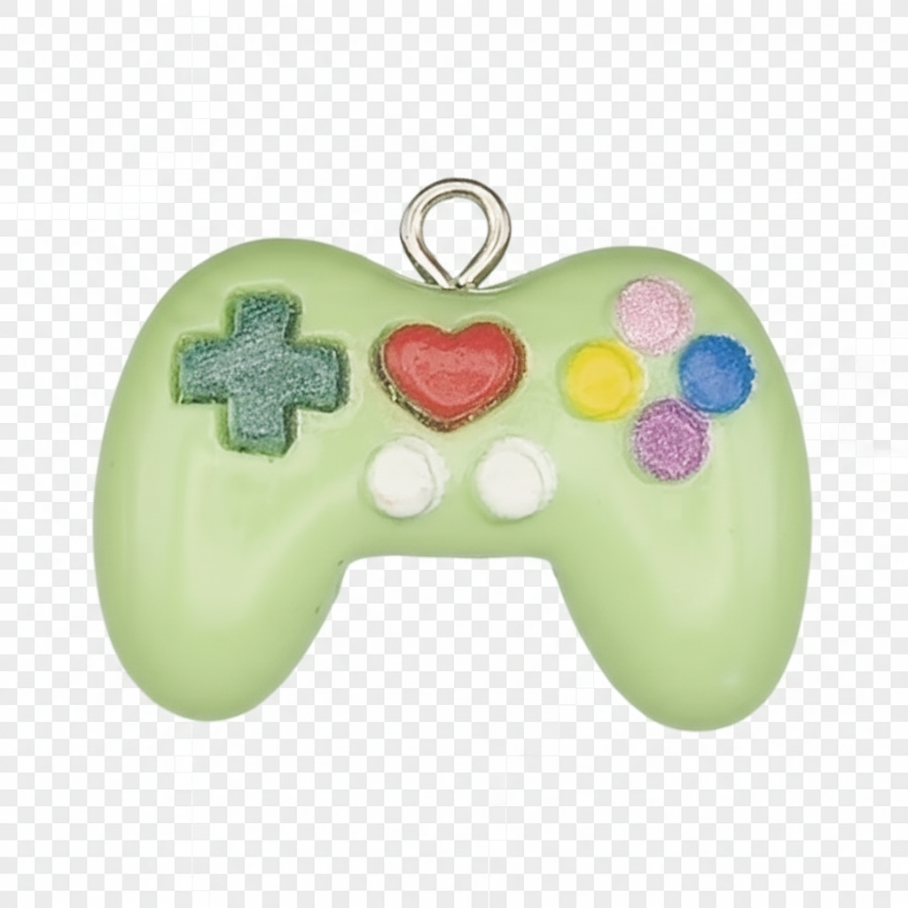 Close-up of a light green game controller charm with multicolor buttons on a black background.