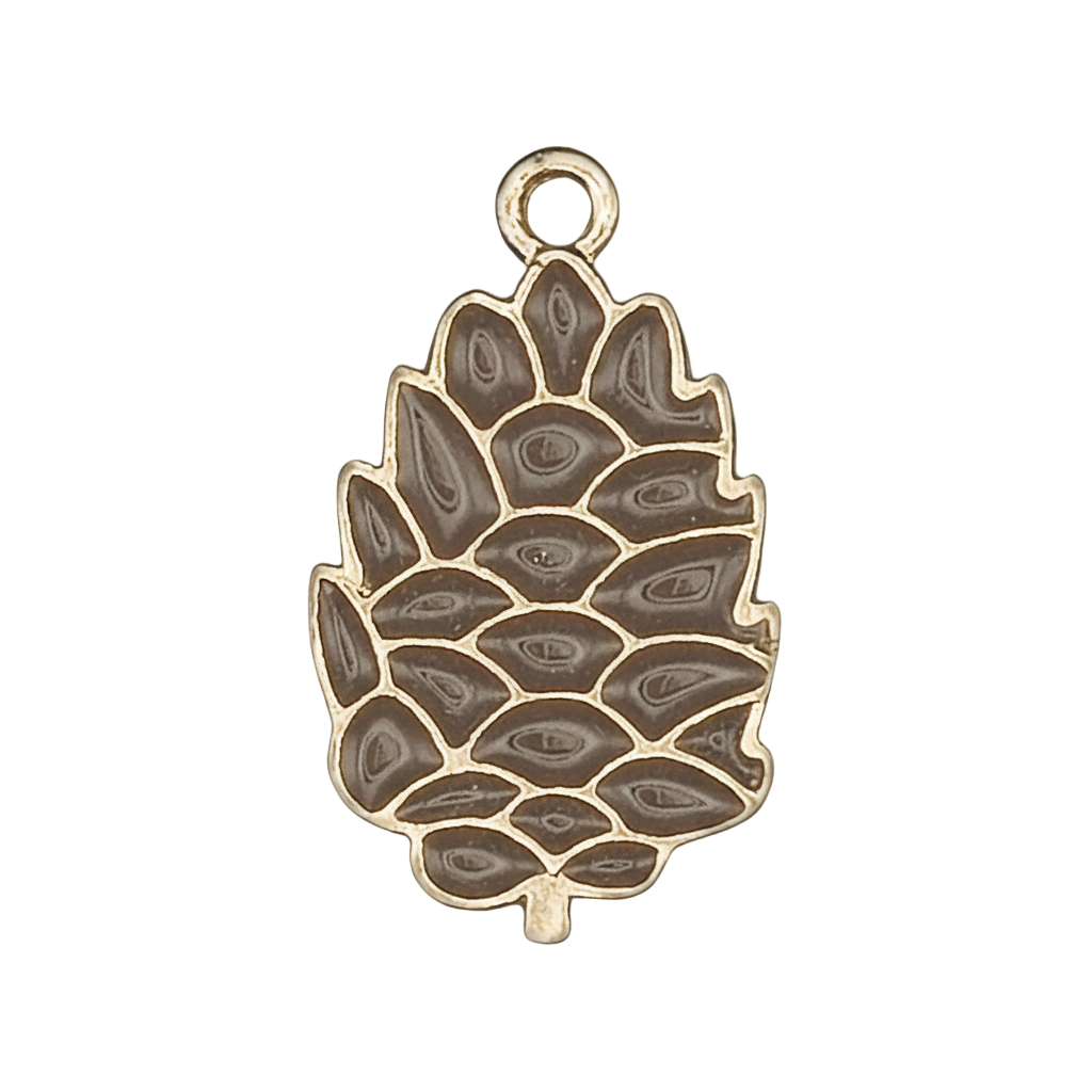 close-up of gold-tone pine cone charm with brown enamel on black background