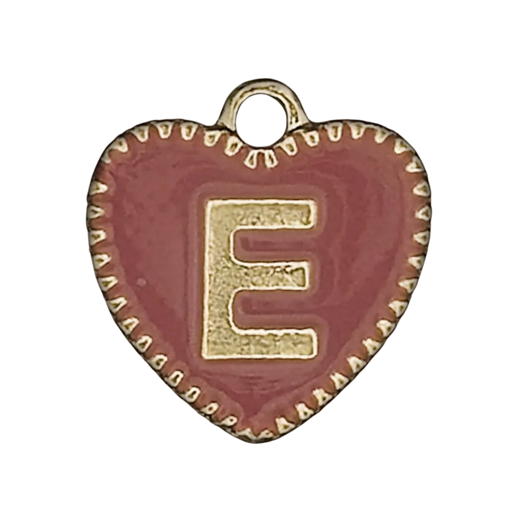close-up of red heart charm with gold letter E