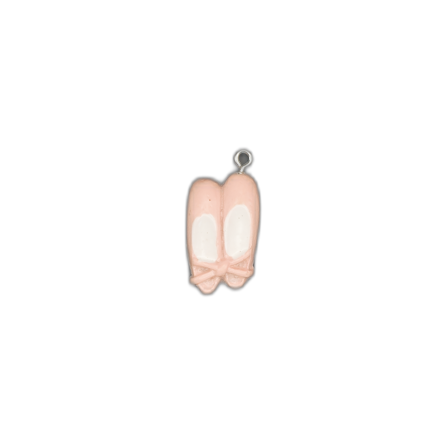 small pink ballet slippers charm centered on black background